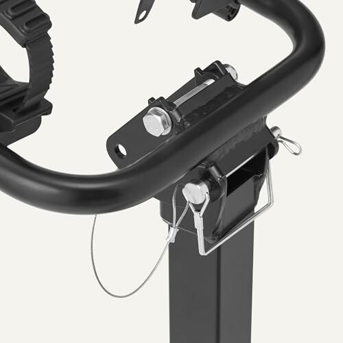Close-up of a bike rack hitch mount with secure locking mechanism.