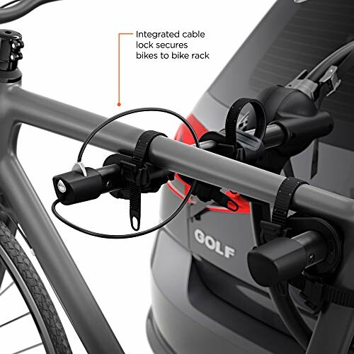 Close-up of a bike rack with an integrated cable lock securing a bicycle to a car.