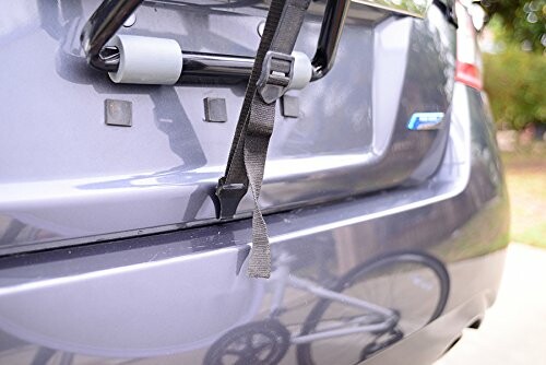 Close-up of a bike rack attached to a car's trunk