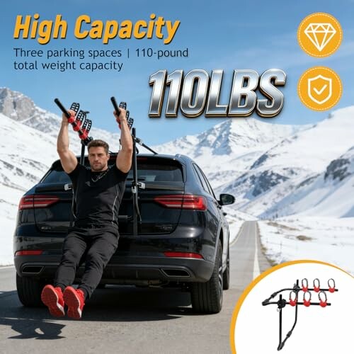 Man demonstrating high-capacity bike rack on car in scenic mountain area.