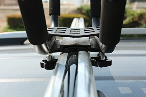 Close-up of a car roof rack attachment.