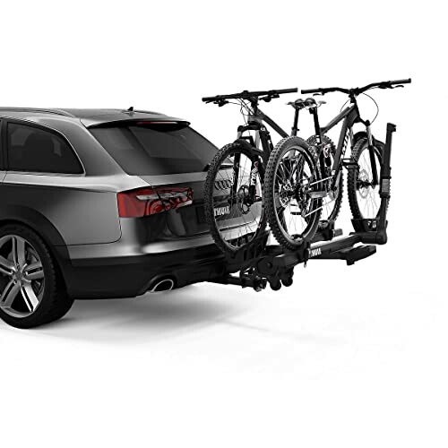 Car with two bicycles on a rear-mounted rack