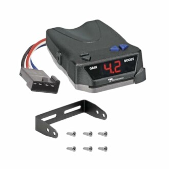 Digital trailer brake controller with wiring and mounting hardware.