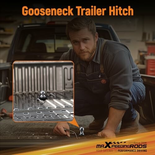 Mechanic installing a gooseneck trailer hitch in a truck bed.