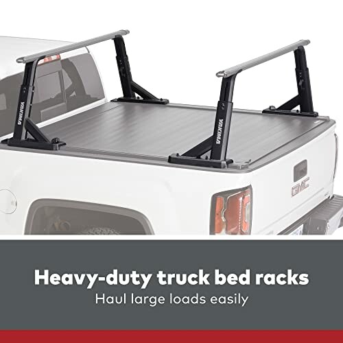 Truck with heavy-duty bed racks for hauling large loads.