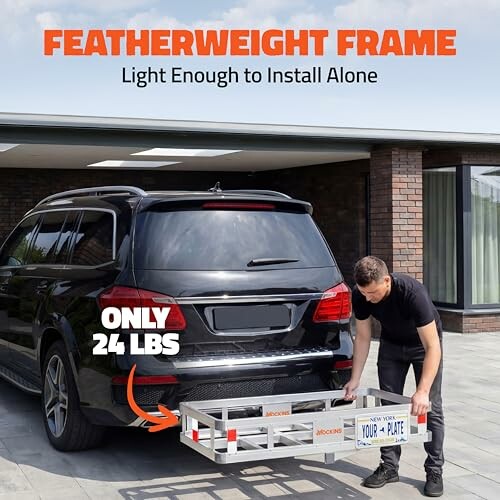 Person installing a lightweight cargo carrier on an SUV