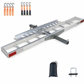 Motorcycle carrier rack with accessories including straps and hitch pin.