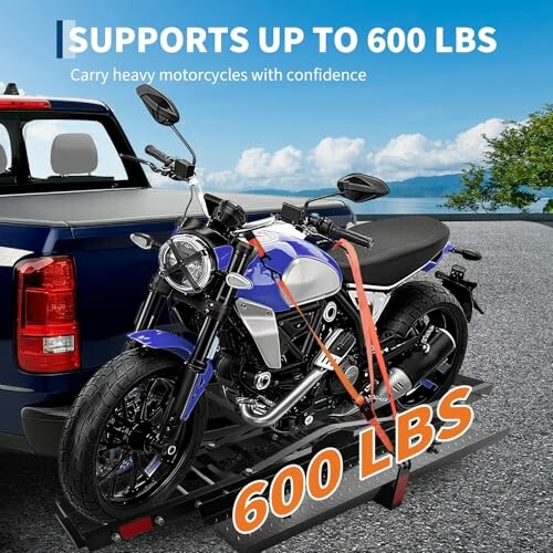 Motorcycle on carrier attached to truck, supports up to 600 lbs.