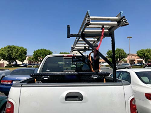 Truck with ladder rack in parking lot