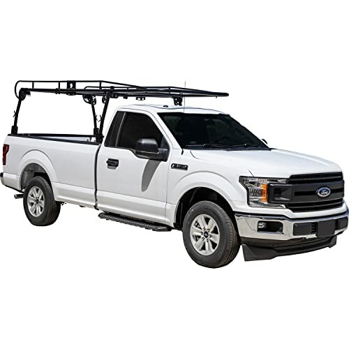 White pickup truck with ladder rack on top.